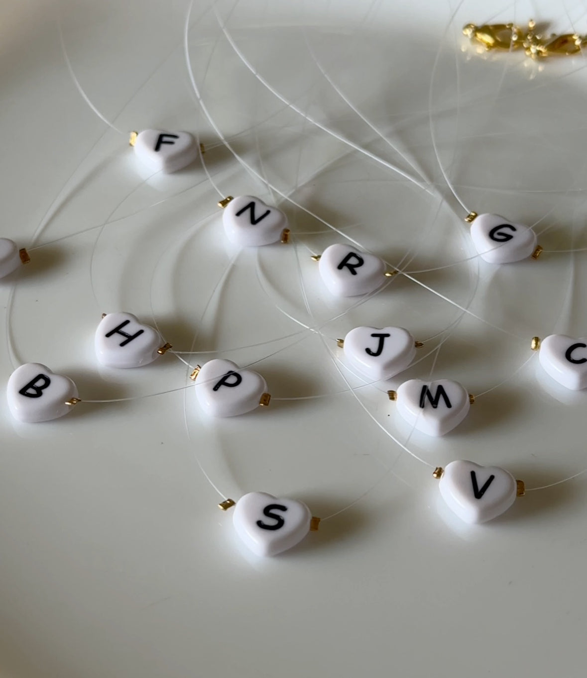 Lyra Necklace – Heart Initial on Transparent String