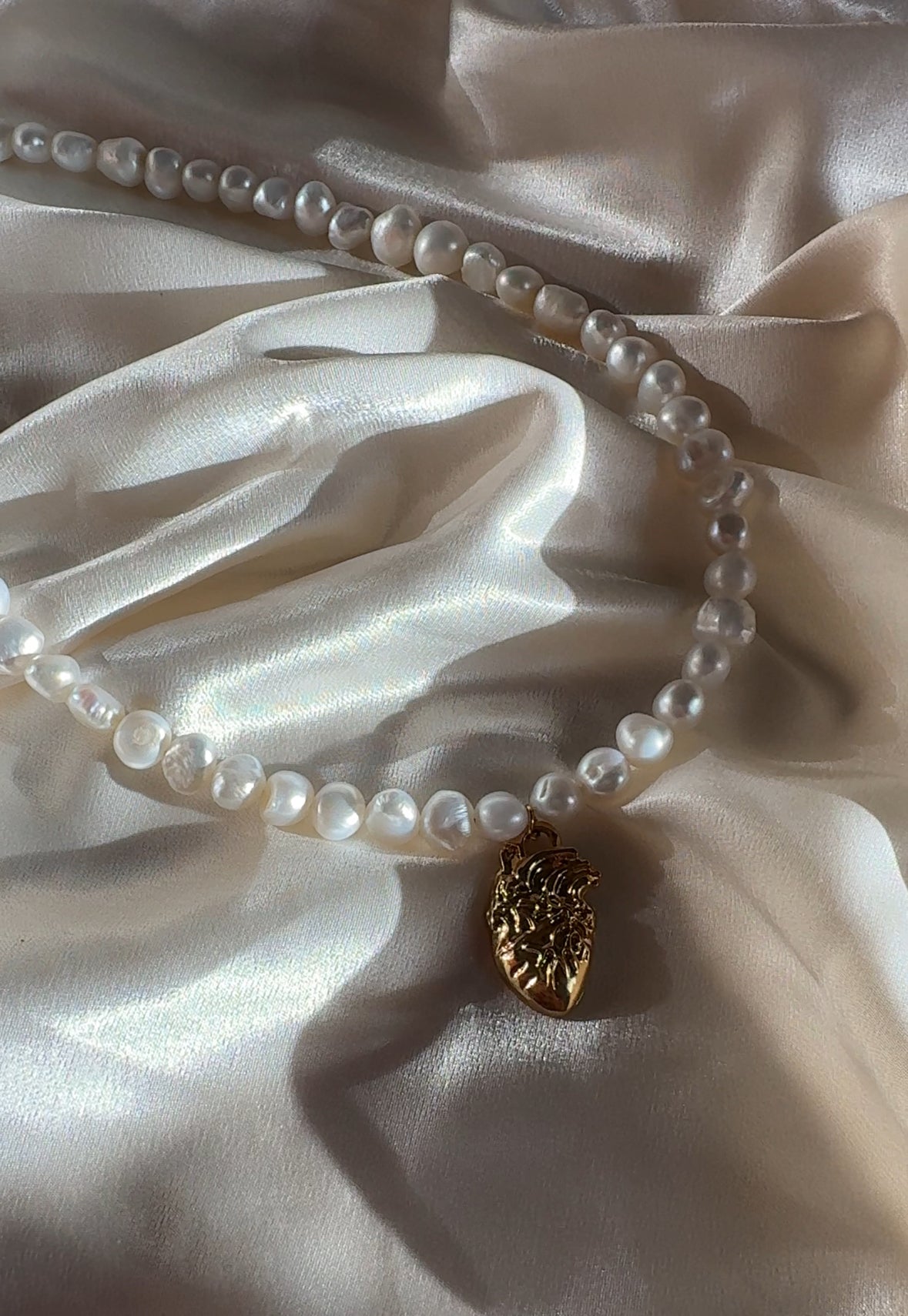 Maya Necklace – Pearl Necklace with Human Heart Charm